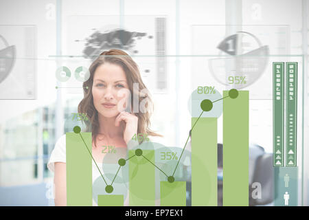 Blonde businesswoman using green chart interface Stock Photo
