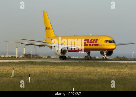 DHL Boeing 757 prepares for take off from runway 31. Stock Photo