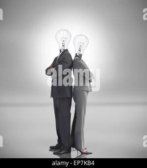 Business people with light bulbs instead of heads Stock Photo