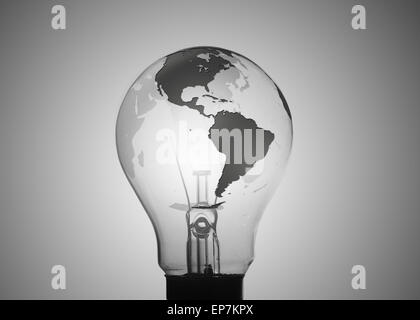 Light bulb with map of earth on its surface Stock Photo