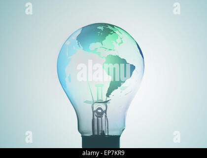 Light bulb with map of earth on its surface in blue and green Stock Photo