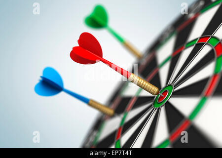 Darts arrow in bull's-eye Stock Photo