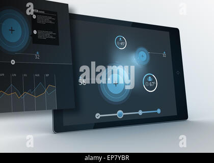 Digital tablet showing data and circles with projection Stock Photo