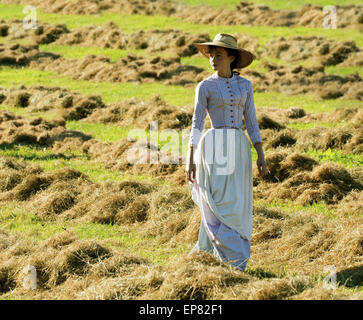 Far from the Madding Crowd is an 2015 British romantic drama film directed by Thomas Vinterberg and starring Carey Mulligan, Matthias Schoenaerts, Michael Sheen, Tom Sturridge, and Juno Temple.  This photograph is for editorial use only and is the copyright of the film company and/or the photographer assigned by the film or production company and can only be reproduced by publications in conjunction with the promotion of the above Film. A Mandatory Credit to the film company is required. The Photographer should also be credited when known. Stock Photo