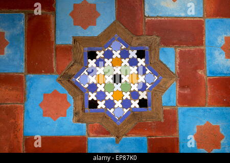 Ceramic tiles, gleaming and colourful, are used for floors and walls. Morocco Stock Photo