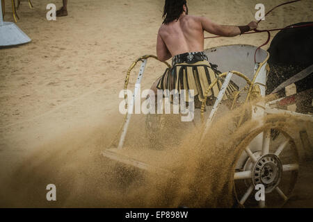 Show, chariot race in a Roman circus, gladiators and slaves fighting Stock Photo