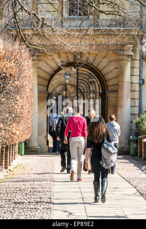 Students entering Clare College, Cambridge University from the back entrance which constitutes part of the famous 'backs' Stock Photo