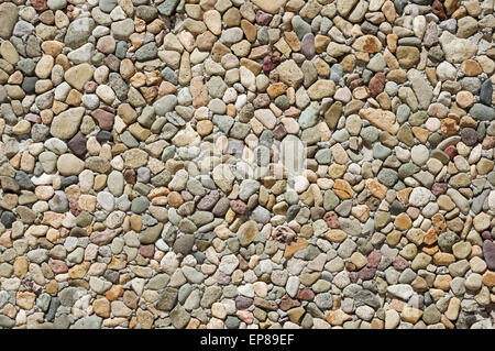 washed pebble concrete wall background texture Stock Photo