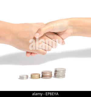 two people shake hand and coin business concept Stock Photo