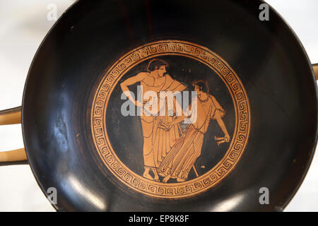 Kylix (drinking cup). Greek, Attic, red-figure, ca 490 B.C. Attributed to Makron. Youth and girl dancing with castanets. Stock Photo