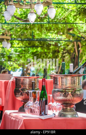 Solemnly laid table with wine glasses, outdoor Stock Photo