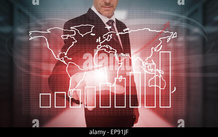 Businessman pressing futuristic chart and world map interface Stock Photo
