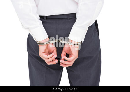 Close up on classy businessman wearing handcuffs Stock Photo