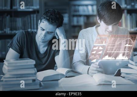Concentrated students working together with futuristic interface Stock Photo