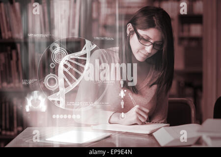 Concentrated mature student studying medicine on digital interface Stock Photo