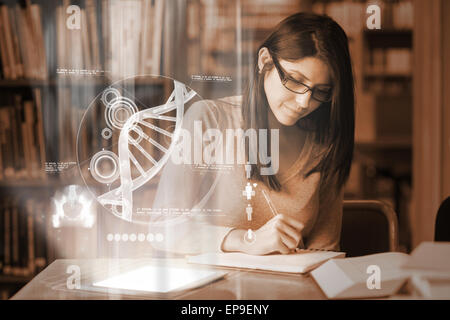 Serious mature student studying medicine on digital interface Stock Photo