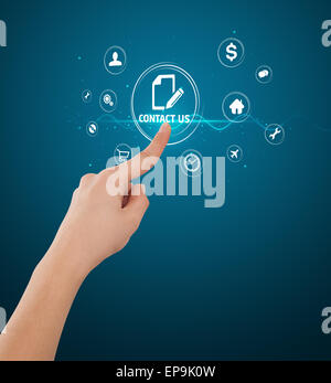 Businessman pressing virtual messaging type of icons Stock Photo