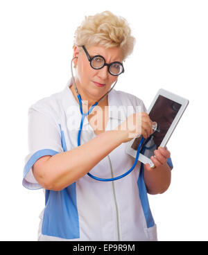 Mature doctor listen tablet PC by stethoscope isolated Stock Photo