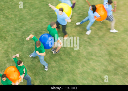 performing fitness ball team building activity Stock Photo