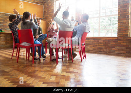 people clapping group therapy session Stock Photo