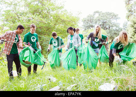 volunteering picking up trash Stock Photo