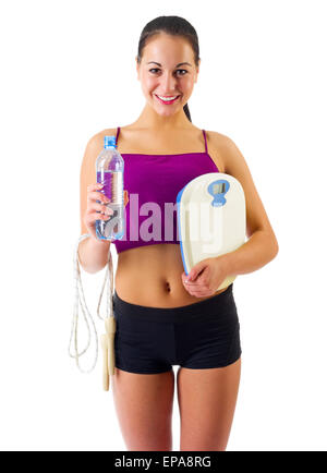 smiling sporty woman with water bottle and towel Stock Photo - Alamy