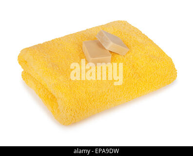 Stack of clean fresh towels in the green basin isolated on white background Stock Photo