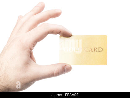 male hand holding gold credit card isolated Stock Photo