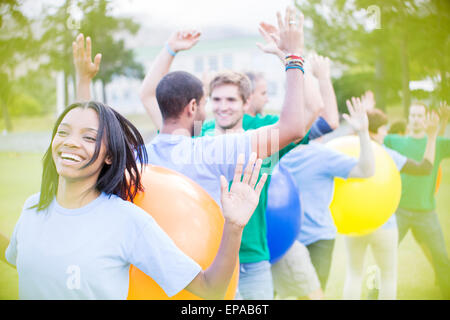 performing fitness ball team building activity Stock Photo