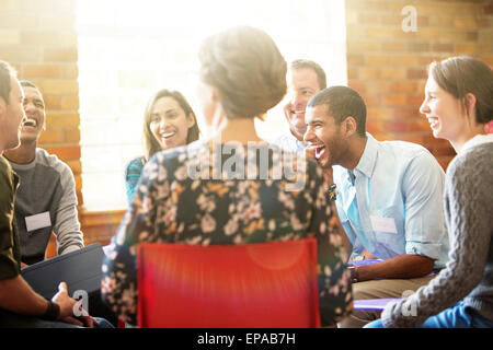 people laughing group therapy session Stock Photo