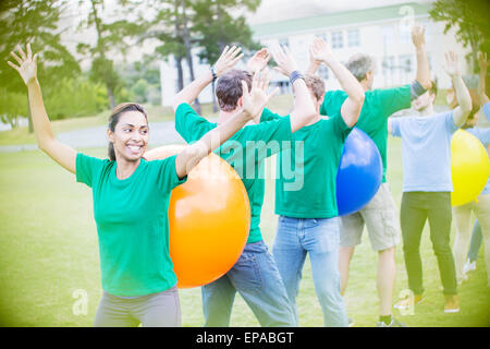 performing fitness ball team building activity Stock Photo