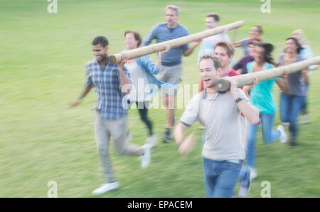 team racing log field Stock Photo