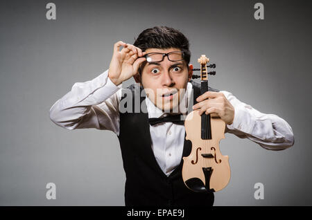 Funny violin player with fiddle Stock Photo