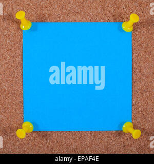 Blank note paper pinned to a noticeboard. Stock Photo