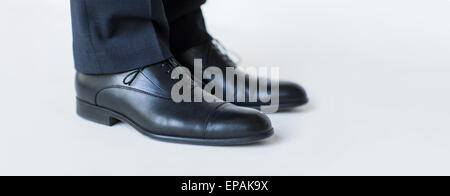close up of man legs in elegant shoes with laces Stock Photo
