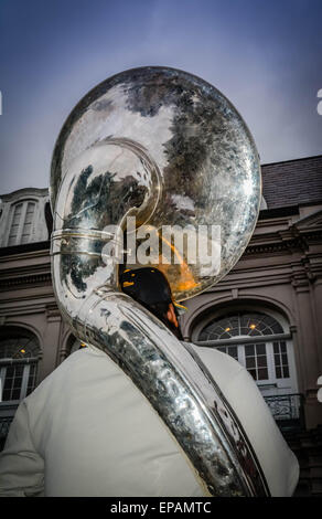 Street musician entertains tourists in Jackson Square with his Tuba in the French Quarter of New Orleans, LA Stock Photo