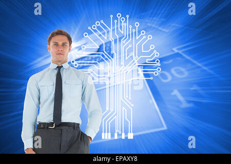 Composite image of serious businessman standing with hand in pocket Stock Photo