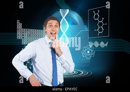 Composite image of thinking businessman touching his chin Stock Photo