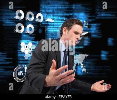 Composite image of businessman posing with arms out Stock Photo