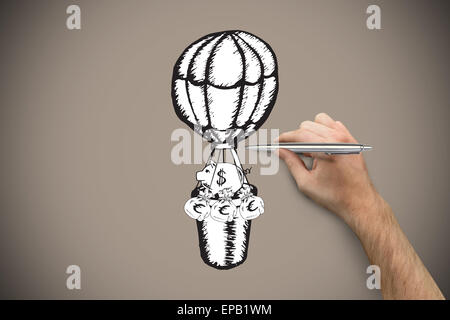 Composite image of hand holding a silver pen Stock Photo