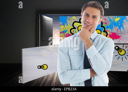 Composite image of thinking businessman with hand on chin Stock Photo