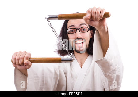 Karate man with nunchucks isolated on white Stock Photo