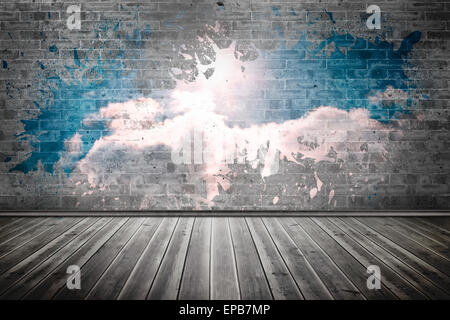 Splash on wall revealing clouds Stock Photo