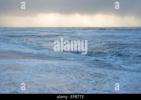 Stormy sea as seen from the beach with high waves Stock Photo