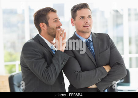 Young well dressed businessmen in discussion Stock Photo