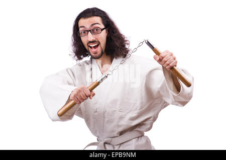 Karate man with nunchucks isolated on white Stock Photo