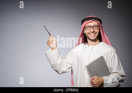 Arab man pressing virtual button Stock Photo