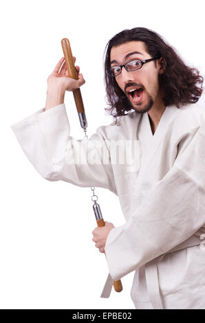 Karate man with nunchucks isolated on white Stock Photo