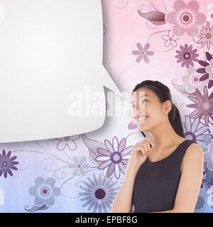 Composite image of thinking businesswoman with speech bubble Stock Photo
