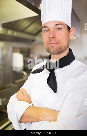 Closeup of a male cook in the kitchen Stock Photo